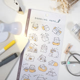 Immerse yourself in the relaxing daily life of Muffinmaru and Devyegg with our Doodling Memo sticker sheet. Featuring loose outlines, these stickers are perfect for adding a touch of charm to your diaries, memos, or notes. This sticker sheet is designed to create a stress-free space. Let these little doodles create a soothing atmosphere wherever you go.&nbsp;

Dimensions: 3.5" x 7.8" (9cm x 20cm)
Material: PET
Quantity: 1 sheet