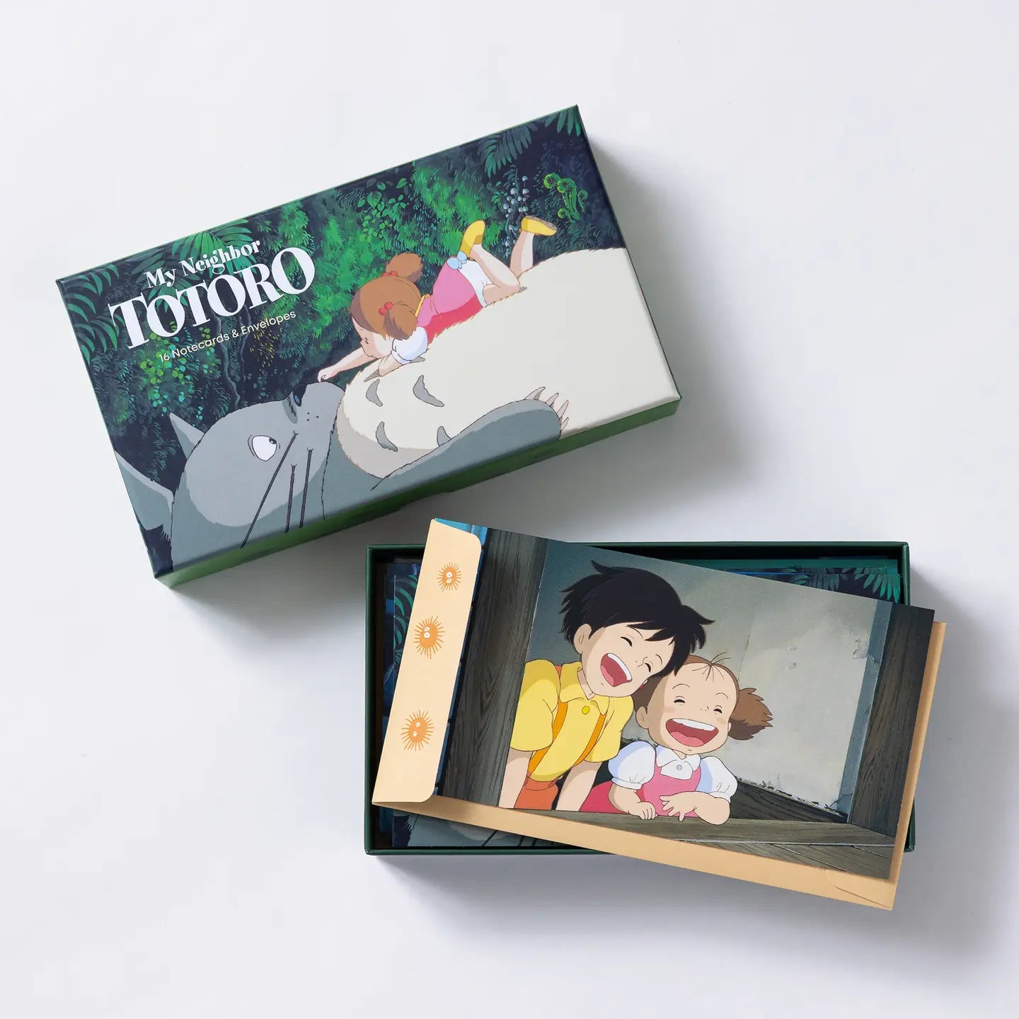 Celebrate friendship and connection with these notecards featuring film stills from My Neighbor Totoro, Studio Ghibli’s animated classic about a family and their adventures with the neighboring forest spirits.

Includes 16 folded cards with full-color artwork (8 designs, repeating twice) and 16 envelopes in a lovely gift box with a pull-off lid.

 © 1988 Hayao Miyazaki/Studio Ghibli