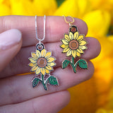 Collar con dije de girasol bañado en plata