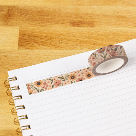 Sunny Poppies Washi Tape

Our washi tape is made for paper lovers, pen pals, and anyone who gets butterflies in the stationery aisle. Perfect for journaling, scrapbooking, decorating envelopes, or adding a personal touch to planners and calendars. It's gentle on paper, easy to tear by hand, and removable without leaving residue, so you can rearrange, redo, and re-stick as needed.

Design Features:&nbsp;

Each roll measures 15mm wide on a 10m roll
Full color repeating pattern
Washi tape dispenser packaging
P