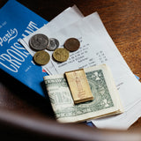 A brass money clip, handcrafted one by one with care.

Not only for holding bills—it’s also useful for keeping documents together with a notebook or planner.

Engraved with the message “God Speed You” and a lighthouse motif, wishing safe travels ahead.

Size: Approx. W2.3 x H5.3cm

As you use it, the brass will develop a natural patina over time—enjoy the changing character that comes with age.

Color: The color you see on your screen may differ from the actual product.

Brass Products

Due to the nature of