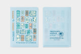 This clear folder features TRAVELER's theme for the year in which "Every TRAVELER'S notebook is unique and that's wonderful." Use this folder to hold stickers, business cards, tickets, stamps, and other scraps you may come across during your travels!