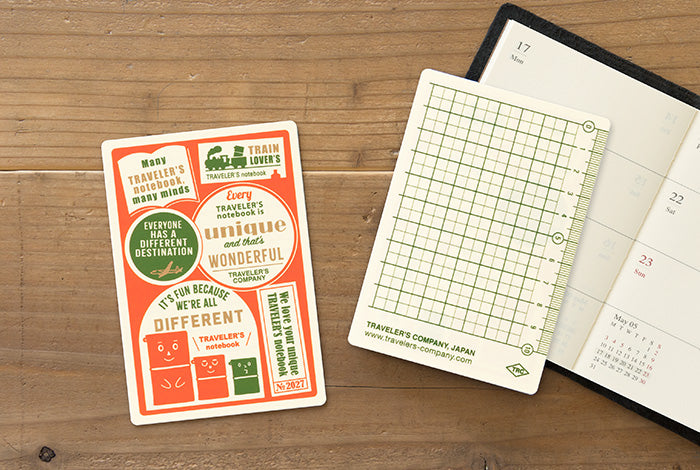 This is a useful plastic sheet for all sorts of situations while traveling, such as writing while standing, using it as a bookmark to instantly open to a certain page, and drawing straight lines with the edge. The theme of the 2027 edition is “Every TRAVELER’S notebook is unique and that’s wonderful.”