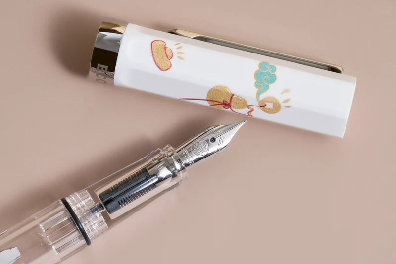 The TWSBI ECO Horse Year Fountain Pen combines warm comforting colors, with an intricate design to celebrate The Year of the Horse, and TWSBI’s reliable writing performance. Its piston-filling system and smooth stainless steel nib deliver a consistent, enjoyable writing experience for journaling, note‑taking, and everyday use.