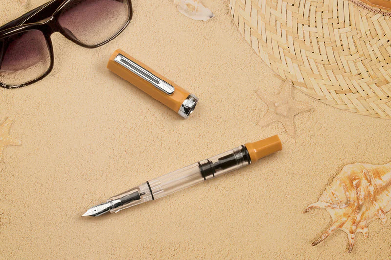 TWSBI ECO Bahama Yellow Fountain Pen

Comes in EF, F, M, B, Stub1.1&nbsp;nib choices
Colors: Yellow/Clear

Pen cap is able to post onto the back of the pen

Piston Filler Fountain pen.
Simply unscrew the end cap, dip into ink, screw back the end cap, and your done! Ready to write!!