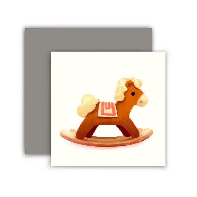 This illustration features an illustrated wooden horse against a white background with a blank interior to write your own greeting.&nbsp;

Single card includes 1 folded card + 1 matching envelope
Blank inside

Dimensions: 2.75 x 2.75 inch
Designed and illustrated by Aggie Cheung for The Little Red House