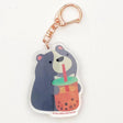 This adorable keychain features a grey and white moon bear sipping a boba milk tea or bubble tea. Includes a rose gold colored metal swivel clasp. Packaged with protective film on both side. All keychains are packaged with illustrated backing card and clear cello bag.


Designed and Illustrated by Aggie Cheung for The Little Red House


Dimension: 1.5 x 2 inches
