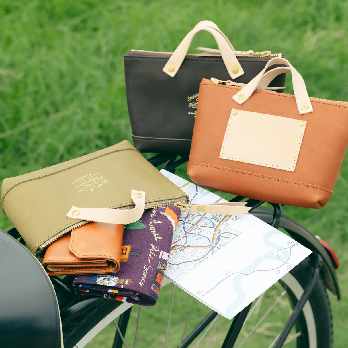 We made a miniature version of our engineer bag as a key case,and somehow, this one turned out a little bigger.

Still, the plump, playful leather pouch is fun to carry and somehow even looks delicious.

It’s sized to fit a paperback or an A6 notebook.

Size: W19.5×H12.5×D4.5cm
About the Leather – Japanese Glove Leather

Made from durable and supple Japanese glove leather, known for its lightness and strength.

Originally used for baseball gloves, this leather is highly resistant to friction and becomes sof