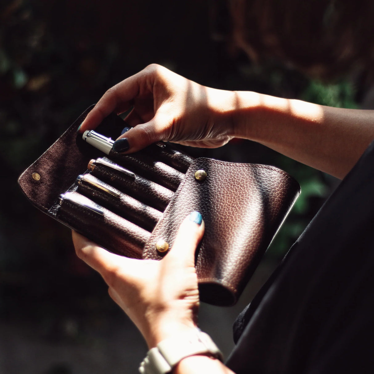 This case for fountain pens can hold five pens individually.

Lined with pig suede for a luxurious look and feel, your precious pens will be well protected and carried.

The buttons are original, made of solid brass and stamped with T.S.L.

SIZE :&nbsp;L13cm × H15cm


COLOR : Camel / Brown&nbsp;/ Black


MATERIAL :&nbsp;Cow leather

Leather Products:

The leather used in this product is natural leather.
We do not use scratches that lead to tears or rips, but we use scratches and wrinkles that are originally