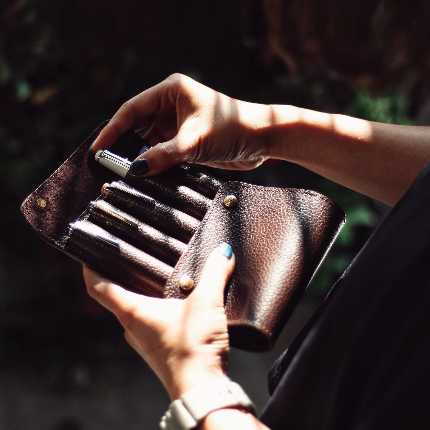 This case for fountain pens can hold five pens individually.

Lined with pig suede for a luxurious look and feel, your precious pens will be well protected and carried.

The buttons are original, made of solid brass and stamped with T.S.L.

SIZE :&nbsp;L13cm × H15cm


COLOR : Camel / Brown&nbsp;/ Black


MATERIAL :&nbsp;Cow leather

Leather Products:

The leather used in this product is natural leather.
We do not use scratches that lead to tears or rips, but we use scratches and wrinkles that are originally