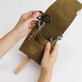 The SUPERIOR LABOR Glove Leather - Tool Holder

The discontinued tool holder&nbsp;is back with a redesigned construction.

The raw-cut edges are accented with a brass tag, and the interior logo is finished with gold foil.&nbsp;The result is a refined, elegant look that still feels light and airy.&nbsp;It’s perfect for carrying pens and other everyday tools.

Size: W10.5×H15.5×D2cm
About the Leather – Japanese Glove Leather

Made from durable and supple Japanese glove leather, known for its lightness and str