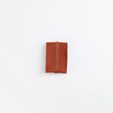 The SUPERIOR LABOR Glove Leather - Tool Holder

The discontinued tool holder&nbsp;is back with a redesigned construction.

The raw-cut edges are accented with a brass tag, and the interior logo is finished with gold foil.&nbsp;The result is a refined, elegant look that still feels light and airy.&nbsp;It’s perfect for carrying pens and other everyday tools.

Size: W10.5×H15.5×D2cm
About the Leather – Japanese Glove Leather

Made from durable and supple Japanese glove leather, known for its lightness and str