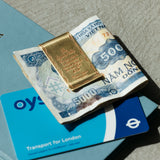A Handcrafted Classic: The Solid Brass Money Clip

Meticulously handcrafted one by one, this classic money clip is built from premium solid brass. While perfect for securing your bills with timeless elegance, it also serves as a versatile companion for your planner, beautifully holding documents and keeping your notes organized.

As you use it, the brass will develop a natural patina over time—enjoy the changing character that comes with age.

Color: The color you see on your screen may differ from the actu
