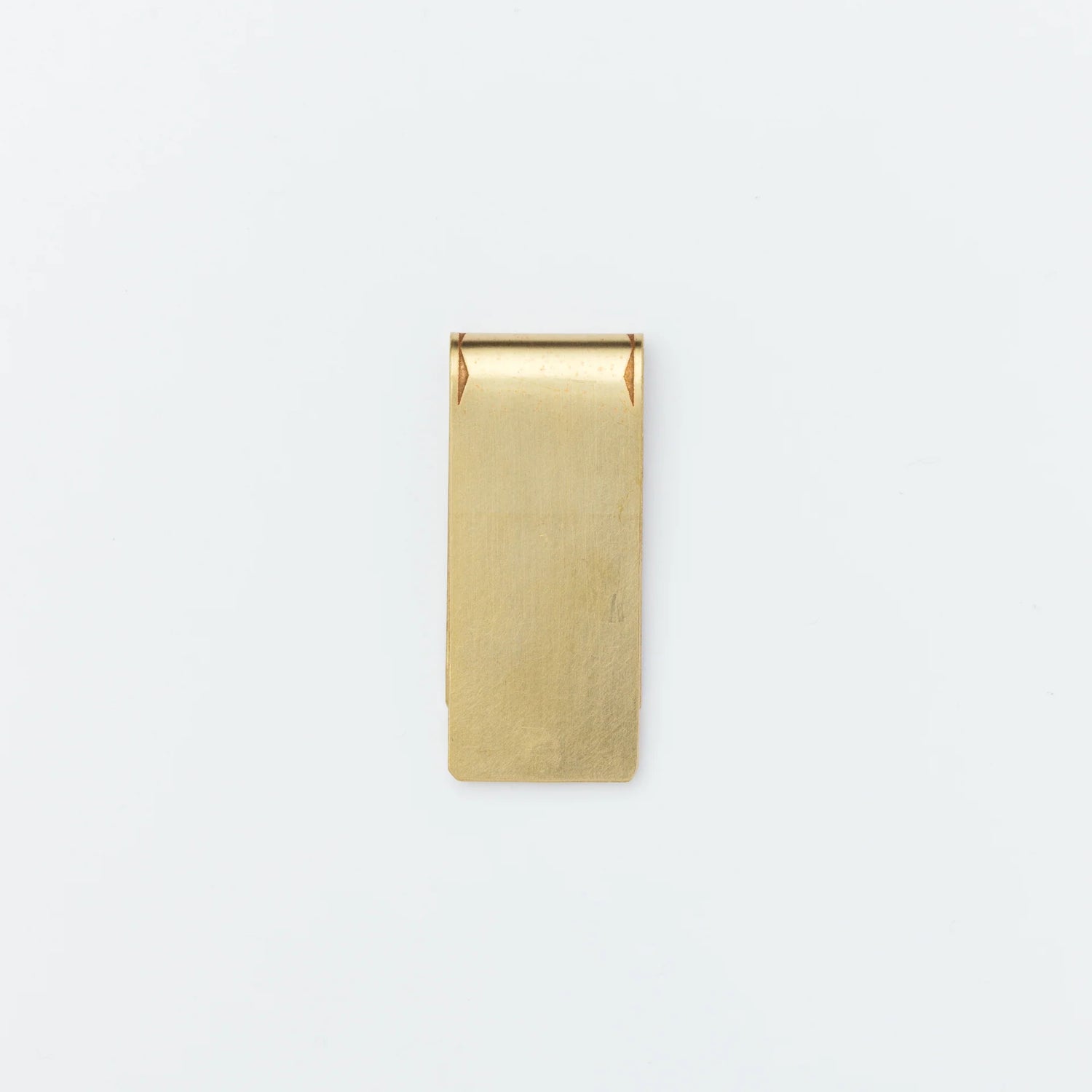 A Handcrafted Classic: The Solid Brass Money Clip

Meticulously handcrafted one by one, this classic money clip is built from premium solid brass. While perfect for securing your bills with timeless elegance, it also serves as a versatile companion for your planner, beautifully holding documents and keeping your notes organized.

As you use it, the brass will develop a natural patina over time—enjoy the changing character that comes with age.

Color: The color you see on your screen may differ from the actu