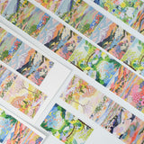 Turn your journal pages into a moving art gallery with the Spring Canvas tape. True to its name, this wide tape features exquisite, hand-painted watercolor artwork that captures the fluid beauty of nature in bloom.