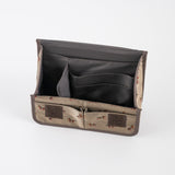 The name Stappo combines the words Stand and Pouch, as it essentially stores your items in a standing pouch. The curves on both sides of the pouch give it a cute shape.