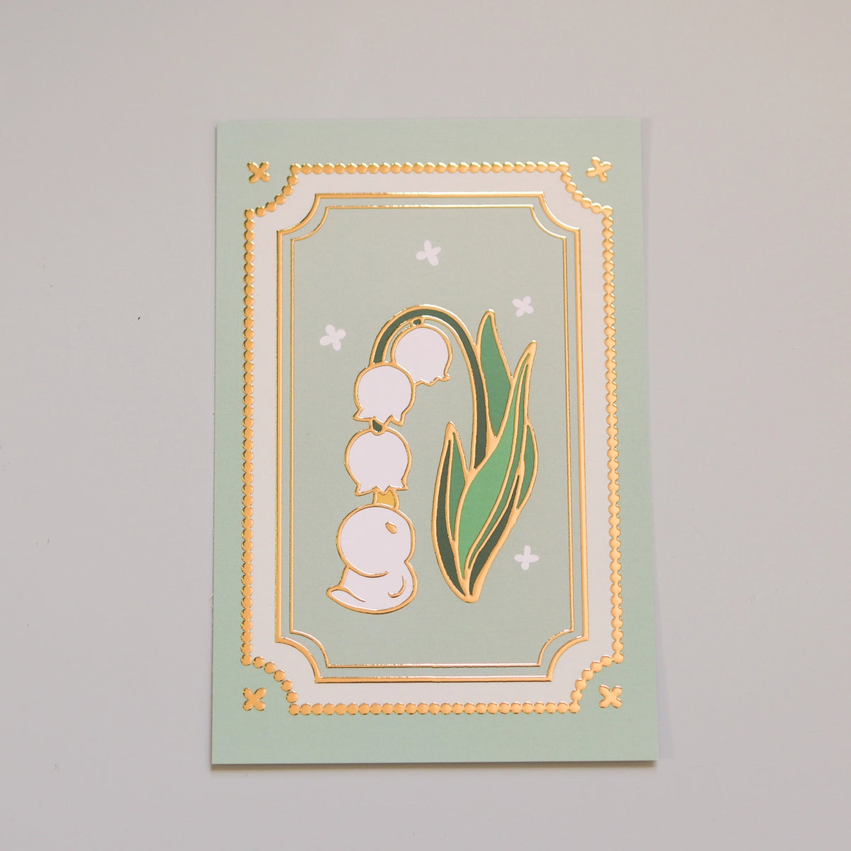 Thousand Skies - Lily of the Valley Postcard

A playful and colorful illustration to brighten someone's day.

• 4 in x 6 in postcard
• Matte finish with gold embossing
• Heavy Cardstock

Please consider that monitor calibrations are all different. The color you see might slightly differ from the photo.

Design ©Thousand Skies