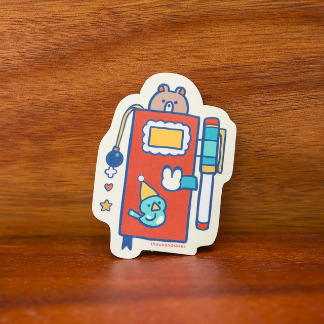 Thousand Skies Holographic Vinyl Sticker - Weekly Journal