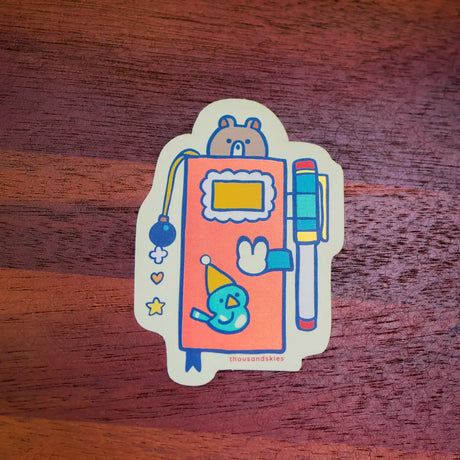 Thousand Skies Holographic Vinyl Sticker - Weekly Journal