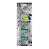Tim Holtz Distress Mini Oxide Ink Pads are a collection of 1 x 1 cubes featuring water-reactive dye &amp; pigment ink fusion that creates an oxidized effect when sprayed with water. Like their larger counterpart, the Mini Oxide Ink Pads have a raised felt pad with fade resistant ink that coordinates with the full Distress palette of colors. Each ink pad is stackable. Use with stamps, stencils, and direct to surface.