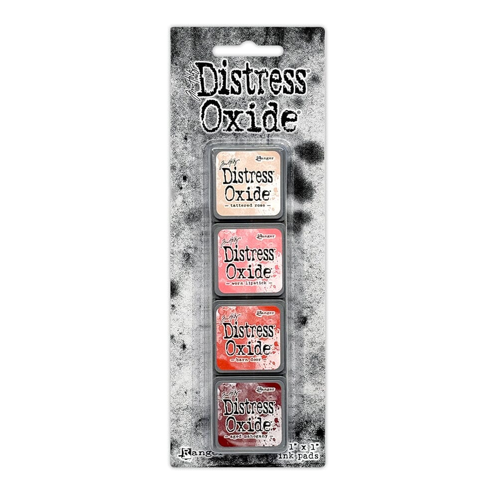 Tim Holtz Distress Mini Oxide Ink Pads are a collection of 1 x 1 cubes featuring water-reactive dye & pigment ink fusion that creates an oxidized effect when sprayed with water