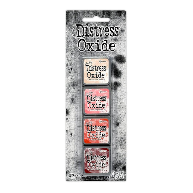 Tim Holtz Distress Mini Oxide Ink Pads are a collection of 1 x 1 cubes featuring water-reactive dye & pigment ink fusion that creates an oxidized effect when sprayed with water