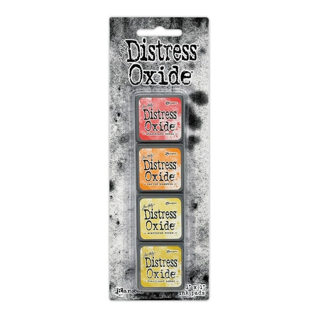 Tim Holtz Distress Mini Oxide Ink Pads are a collection of 1 x 1 cubes featuring water-reactive dye & pigment ink fusion that creates an oxidized effect when sprayed with water.