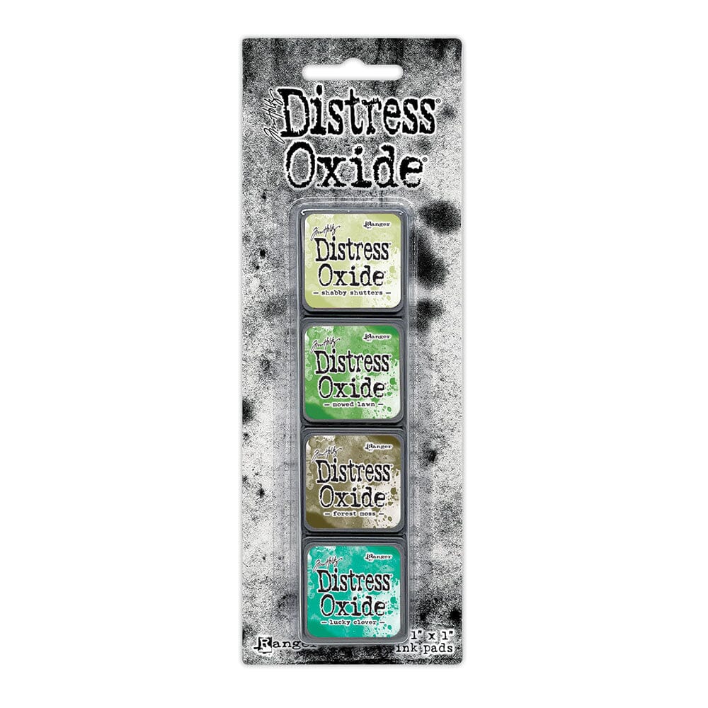 Tim Holtz Distress Mini Oxide Ink Pads are a collection of 1 x 1 cubes featuring water-reactive dye & pigment ink fusion that creates an oxidized effect when sprayed with water.