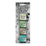 Tim Holtz Distress Mini Oxide Ink Pads are a collection of 1 x 1 cubes featuring water-reactive dye & pigment ink fusion that creates an oxidized effect when sprayed with water.