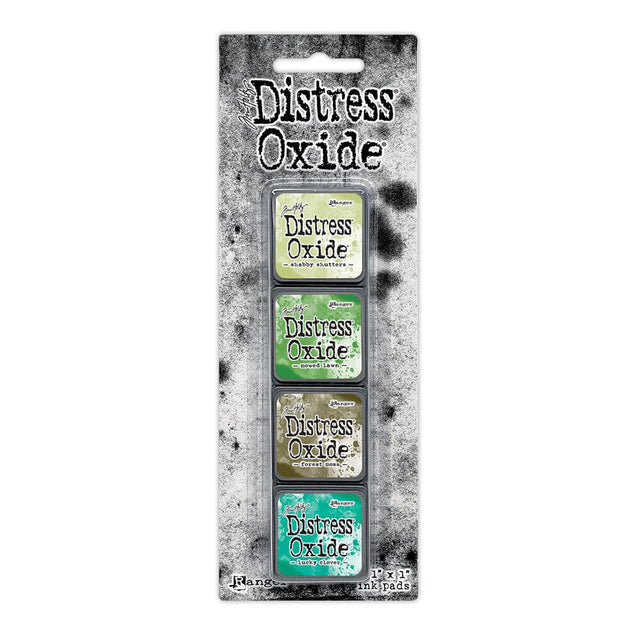 Tim Holtz Distress Mini Oxide Ink Pads are a collection of 1 x 1 cubes featuring water-reactive dye & pigment ink fusion that creates an oxidized effect when sprayed with water.