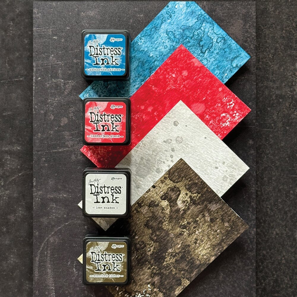 Tim Holtz® Mini Distress Ink Pads are a collection of 1 x 1 water-based dye inks. Like their larger counterpart, the Minis feature a raised felt pad with ink that is reactive with water and coordinates with the Distress palette of products. Each ink pad is stackable and fade resistant. Mini Ink Pads can be re-inked with matching Distress Ink Re-inker. Sold in both coordinating sets and individually.