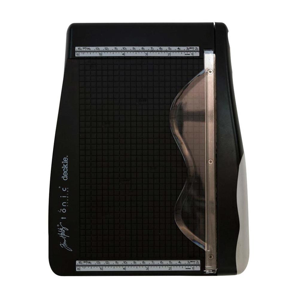 The Tim Holtz Deckle Torn Edge Trimmer gives your projects the perfect distressed deckle edge effect with maximum control and precision. Designed to provide effortlessly repeatable deckle effects, this new cutting tool from Tim Holtz and Tonic Studios is essential for any crafter looking to bring life to their next design. Combine with different papers and card stock for varying torn edge effects.