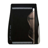 The Tim Holtz Deckle Torn Edge Trimmer gives your projects the perfect distressed deckle edge effect with maximum control and precision. Designed to provide effortlessly repeatable deckle effects, this new cutting tool from Tim Holtz and Tonic Studios is essential for any crafter looking to bring life to their next design. Combine with different papers and card stock for varying torn edge effects.