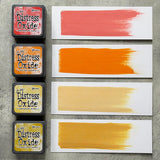 Tim Holtz Distress Mini Oxide Ink Pads are a collection of 1 x 1 cubes featuring water-reactive dye & pigment ink fusion that creates an oxidized effect when sprayed with water.