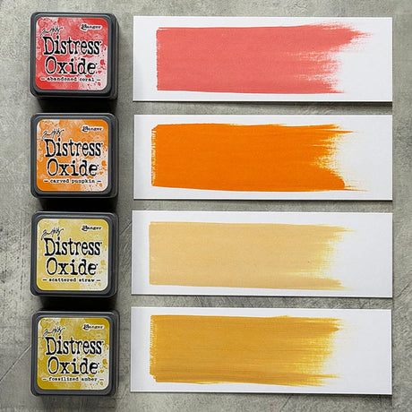 Tim Holtz Distress Mini Oxide Ink Pads are a collection of 1 x 1 cubes featuring water-reactive dye & pigment ink fusion that creates an oxidized effect when sprayed with water.