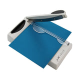 The Tim Holtz 6.25 inch / 16cm Mini Trimmer has many features not found in similar products. This product is portable and lightweight. It is perfect for trimming photographs and creating card fronts.

Features include: Hardened steel precision ground blade, Molded in measuring grid, 6.25 inch / 16cm cutting blade length and Finger guard that holds your paper in position for the perfect cut.

Width &nbsp; &nbsp;5.4 in &nbsp; &nbsp;/ &nbsp; &nbsp;13.72 cm
Height &nbsp; &nbsp;1.7 in &nbsp; &nbsp;/ &nbsp; &nbsp