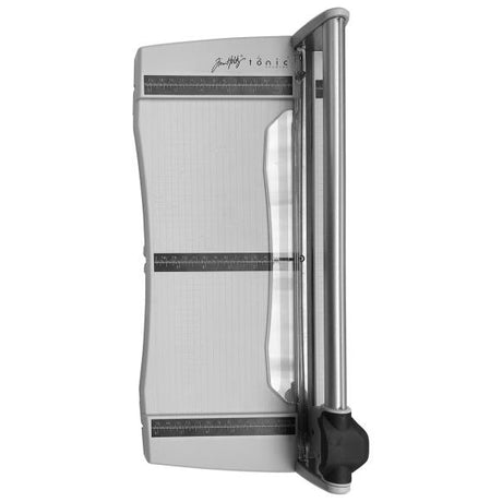 Featuring a geared rotary cutting blade, this trimmer effortlessly cuts through a range of crafting mediums. The trimmer offers both imperial and metric rulers, as well as a handy 0.25 inch gridded base with popular paper sizes for ease of use. With a compact base that has a cutting length of 12.5 inch/31.5cm and extendable arms that can expand it to 12 inch/30.5cm, this trimmer is both versatile and practical.