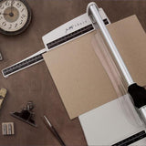 Featuring a geared rotary cutting blade, this trimmer effortlessly cuts through a range of crafting mediums. The trimmer offers both imperial and metric rulers, as well as a handy 0.25 inch gridded base with popular paper sizes for ease of use. With a compact base that has a cutting length of 12.5 inch/31.5cm and extendable arms that can expand it to 12 inch/30.5cm, this trimmer is both versatile and practical.