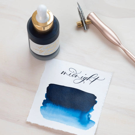 These acrylic inks truly are a celebration of Inky Goodness. Made in the UK and designed for smooth flow and rich color, perfect for calligraphy and illustration.

Recyclable glass bottle adorned with gold foiled paper label
Bottle comes with a handy pipette, making application easy
Lightfast, permanent and water resistant
Holds 30 ml of ink
Suitable for use with calligraphy and dip pens

Good to Know:

Not compatible with fountain pens or the Lumos Pro/Mini.
Shake well before use.