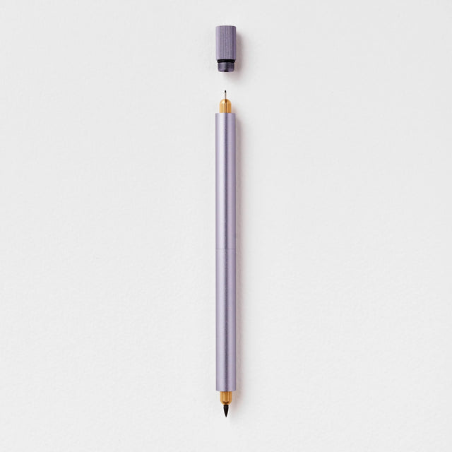 Tom's Studio - Lumos Pro Duo Refillable Pen - Lilac

A beautiful and infinitely refillable fineliner, writing, and brush pen, including 9 professional artist's tips and 2 writing tips