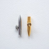 An experimental calligraphy nib. This nib is a delight for illustrators and calligraphers, offering the ability to adjust the nib for a wide range of stunning line variations. With a simple twist of the thumb screw, you can produce broader or finer lines, or change the nib's angle to the page to create rich, thick strokes.