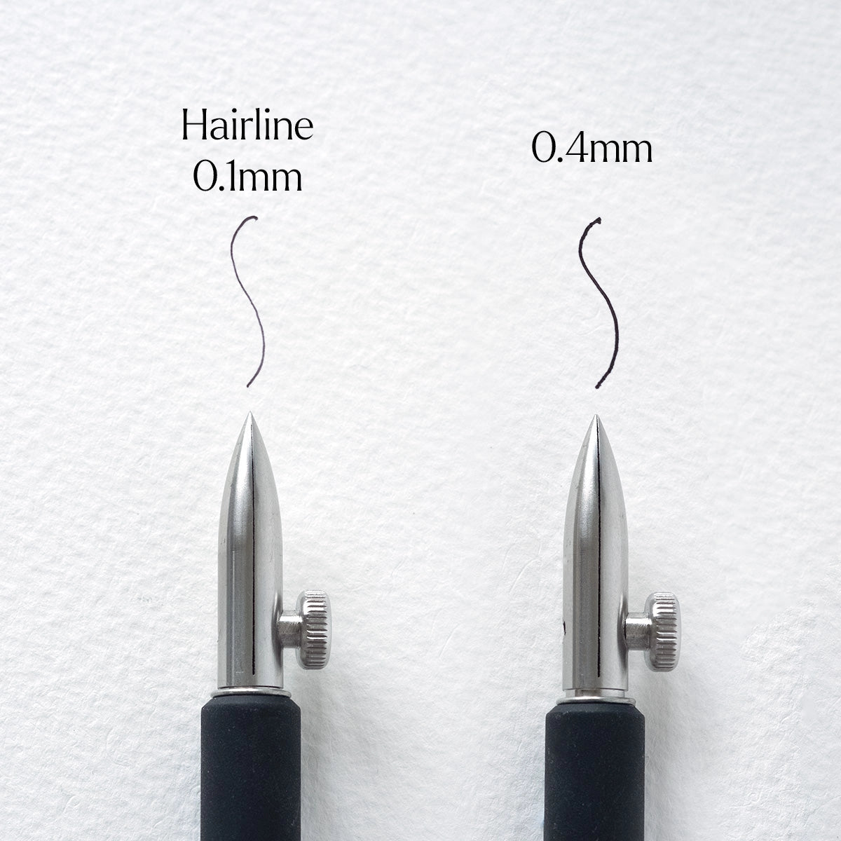 An experimental calligraphy nib. This nib is a delight for illustrators and calligraphers, offering the ability to adjust the nib for a wide range of stunning line variations. With a simple twist of the thumb screw, you can produce broader or finer lines, or change the nib's angle to the page to create rich, thick strokes.