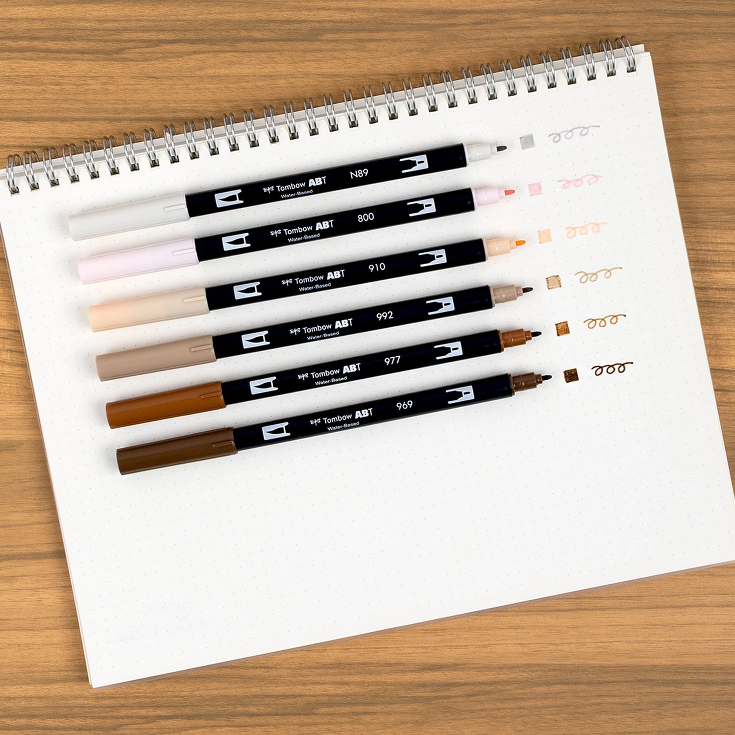 Set of 6 colors. Dual Brush Pens feature a flexible brush tip and a fine tip in one marker. The brush tip works like a paintbrush to create fine, medium, or bold strokes, while the fine tip provides consistent lines. The Coffee Break palette is inspired by rich coffee tones and warm neutrals, perfect for cozy and inviting designs. The water-based ink is blendable, and the resilient nylon brush retains its point stroke after stroke.