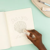 The MONO Natural Eraser is biomass-derived made from 10% scallop shells! This new environmentally friendly eraser offers the same high-quality performance as the original MONO Eraser, cleanly removing unwanted lines and marks with little pressure and without damaging paper.