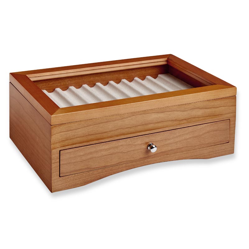 Solid wood box to display and protect up to 20 pens. Our True Writer Pen Box offers space to hold 10 pens in the top case and 10 additional pens in the bottom drawer, lined with suede to protect your precious pens from scratches. The glass top allows you to see and display your beautiful collection. It makes the perfect gift for the pen collector and aficionado. Make it personal with a monogram on the glass lid.