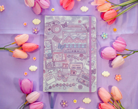 Unicorn Eclipse - Magical Memories Dotted Journal

✧Size &amp; Materials✧

Size: A5 (approximately 5.8 x 8.3 inches)
Smooth hardcover, rounded corners
160 dot grid pages, 140 gsm
Includes ribbon bookmark, elastic band, and back pocket