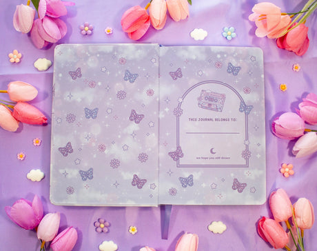 Unicorn Eclipse - Magical Memories Dotted Journal

✧Size &amp; Materials✧

Size: A5 (approximately 5.8 x 8.3 inches)
Smooth hardcover, rounded corners
160 dot grid pages, 140 gsm
Includes ribbon bookmark, elastic band, and back pocket