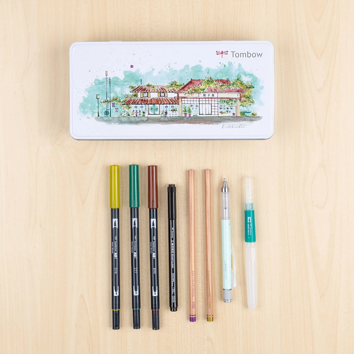 Bring your surroundings to life with the Tombow Urban Sketching Set, designed for artists who love capturing city views, small towns, and daily scenes.

Each set includes:

3 Dual Brush Pens
2 Kimonogatari Colored Pencils
Medium Water Brush
MONO Graph Mechanical Pencil in Mint Green
MONO Drawing Pen in 005
Step-by-step digital guide.&nbsp;
