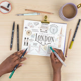 Bring your surroundings to life with the Tombow Urban Sketching Set, designed for artists who love capturing city views, small towns, and daily scenes.

Each set includes:

3 Dual Brush Pens
2 Kimonogatari Colored Pencils
Medium Water Brush
MONO Graph Mechanical Pencil in Mint Green
MONO Drawing Pen in 005
Step-by-step digital guide.&nbsp;