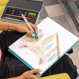 Bring your surroundings to life with the Tombow Urban Sketching Set, designed for artists who love capturing city views, small towns, and daily scenes.

Each set includes:

3 Dual Brush Pens
2 Kimonogatari Colored Pencils
Medium Water Brush
MONO Graph Mechanical Pencil in Mint Green
MONO Drawing Pen in 005
Step-by-step digital guide.&nbsp;